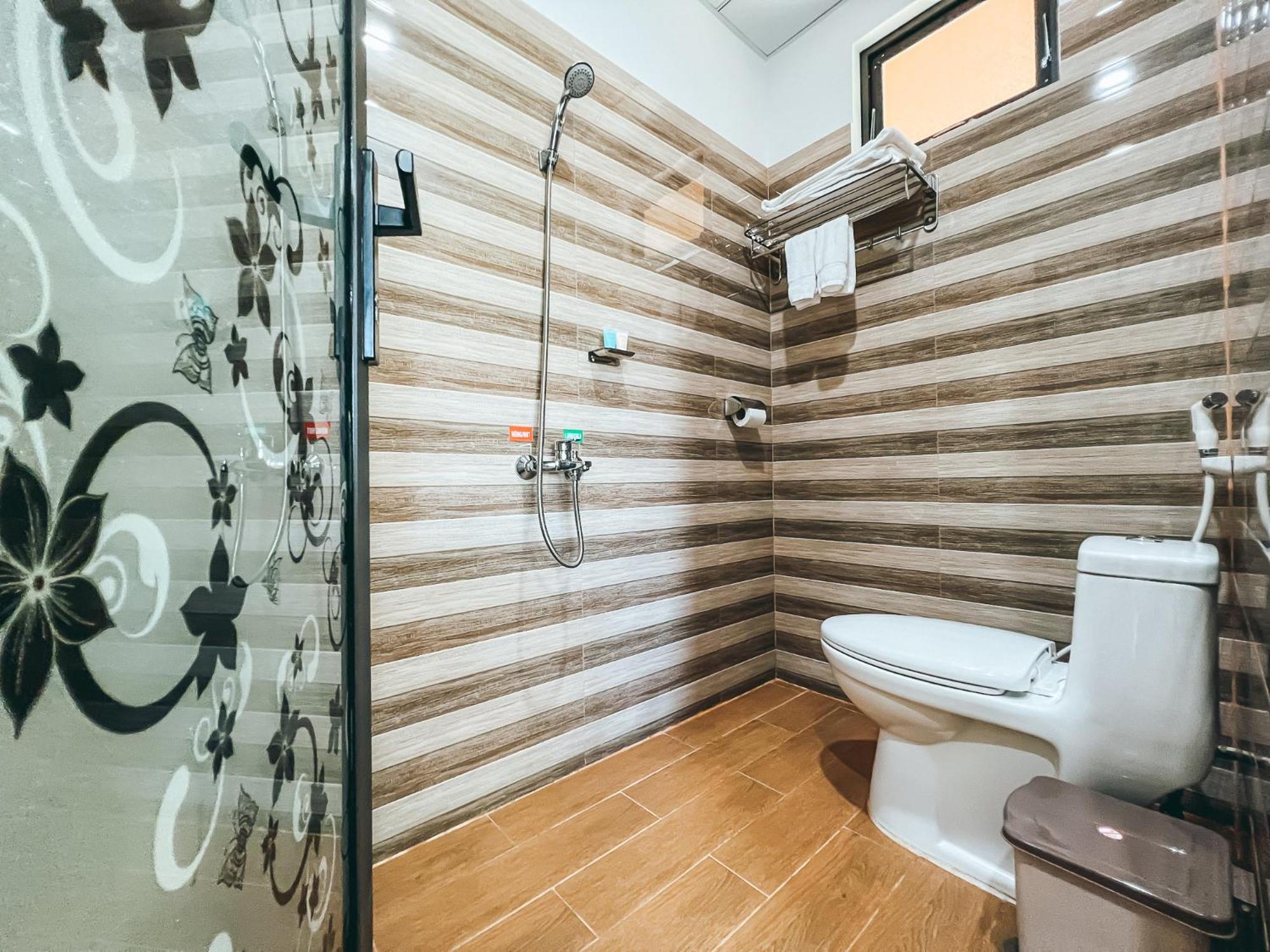 Bazan Home - Hotel & Bungalow Pleiku Szoba fotó